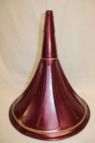 An old painted metal gramophone horn