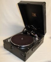 An old table-top gramophone by HMV with chromium plated mounts