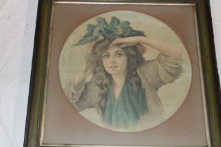 An Edwardian coloured engraving on fabric depicting a bust portrait of a female,