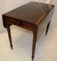 A Victorian mahogany rectangular Pembroke table with a drawer in one end on turned tapered legs 36"