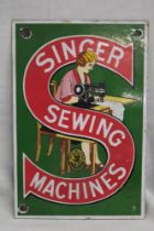 A rectangular enamelled advertising sign "Singer Sewing Machines",