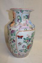 A 20th century Chinese pottery tapered vase with bird and floral decoration (af),