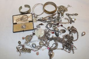 A quantity of various costume jewellery including silver necklaces, bracelets, brooches,