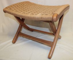 A 1960's beech folding stool with string-work seat