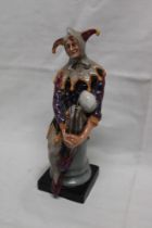 A Royal Doulton china figure "The Jester"