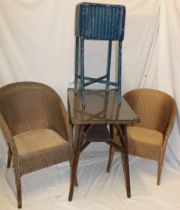 Four pieces of original Lloyd loom furniture including a pair of gilt basket chairs,