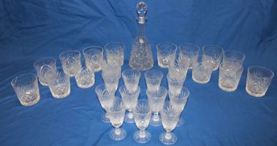 A set of sixteen cut-glass tumblers,