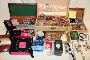 A large selection of various costume jewellery including ladies and gents wristwatches, bracelets,