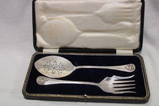 A pair of good quality silver-plated salad servers with raised decoration in velvet lined case