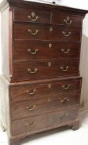 A George III mahogany chest-on-chest, the base with three long graduated drawers,