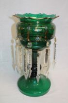 A Victorian green tinted glass table lustre with glass lozenge droplets 14 1/2" high