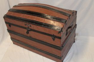 A Victorian painted domed Saratoga trunk with part fitted interior