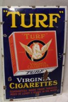 An enamel rectangular advertising sign "Turf Virginia Cigarettes Guaranteed Made From Tobacco Aged