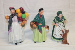 Three Royal Doulton china female figures "Old Mother Hubbard/The Orange Lady/Biddy Penny Farthing"