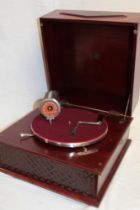 A table-top gramophone by Diamond in polished mahogany square case