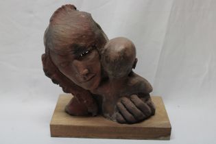 A modern terracotta figure "Mother and Child",