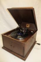 An old table top gramophone by His Master's Voice with chromium plated mounts in oak case