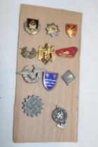 A selection of various German Second War miniature stick-pins and lapel badges