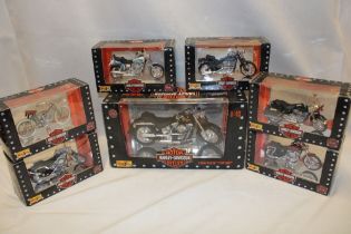 Seven Maisto mint and boxed Harley-Davidson diecast motorcycles