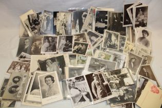 A large selection of various commemorative postcards,