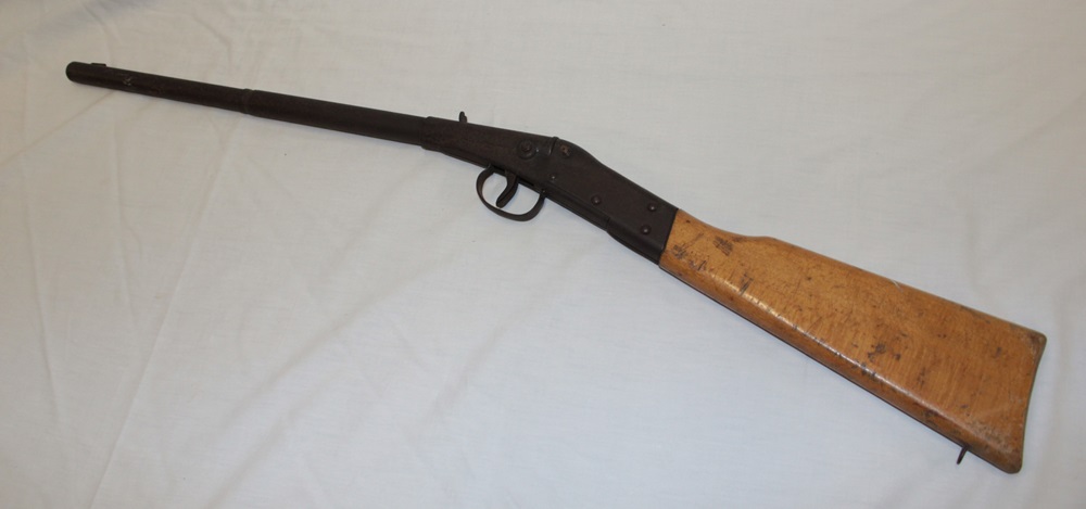 An old tin-plate Milbro Scout air rifle