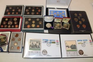 A selection of various coin sets including 1984, 1986 and 1990, GB 1955 boxed coin set,