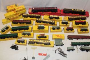 A selection of boxed Tri-ang TT gauge railway goods wagons and carriages,