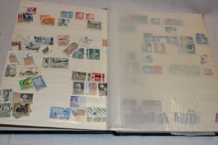 A stock book containing a collection of Sweden stamps