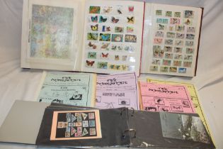 Two stock books containing a selection of thematic butterfly stamps together with GB postcards and