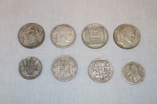 A selection of Foreign silver coins including Spanish 1870 silver 2 pesetas,