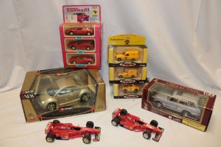 A Burago mint and boxed 1:18 VW Beetle, various Corgi AA diecast vehicles and other boxed vehicles,