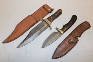 A good quality sheath knife with Damascus single edged blade and burr grips in leather sheath and