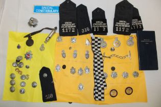 A collection of various Police badges including King's Crown Metropolitan Special Constabulary