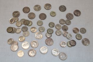 Seventeen various silver shillings and a selection of approximately 35 various silver sixpences