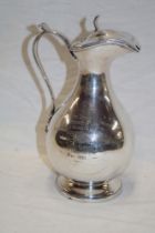 A Victorian silver plated baluster-shaped wine jug with military presentation text for the 1st