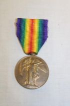 A First War victory medal awarded to No. 17064 Pte. C.