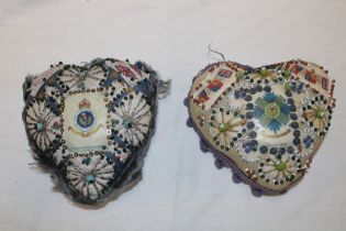 Two First War soldiers heart-shaped pincushions decorated with badges for the Royal Scot's