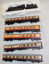 Hornby OO gauge - 2-6-0 locomotive and tender and 5 maroon and cream coaches