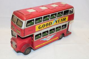 A Japanese ATD tin plate friction powered London double deck bus