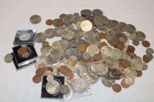 A selection of mixed GB coins including some silver examples, numerous Churchill crowns,