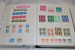A stock book containing a collection of GB stamps,