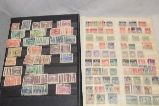 Two stock books containing a selection of Czechoslovakia stamps and related stamps