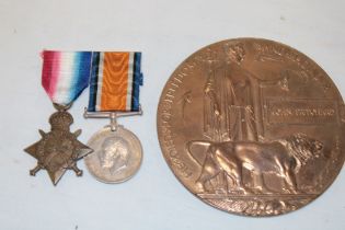 A 1914/15 star and British War medal together with bronze memorial plaque awarded to No. 20393 Pte.