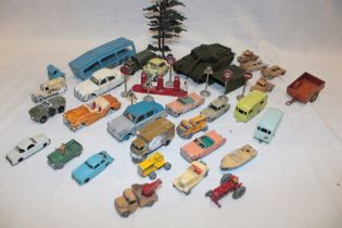 A selection of various diecast vehicles including Dinky Toys Centurion tank,