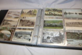 An album containing a selection of over 450 various black and white and coloured postcards -