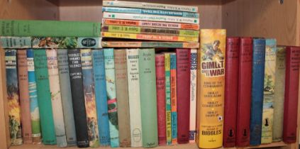 Johns (WE) A collection of over seventy various Biggles related volumes including paperbacks,