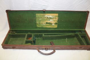 An old canvas and leather baize lined gun case to fit 30" barrels