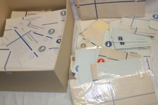 A box containing a large quantity of mainly mint GB postal stationery including large registered