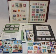 An album of various World stamps, stock card of mint Lundy Island stamps,