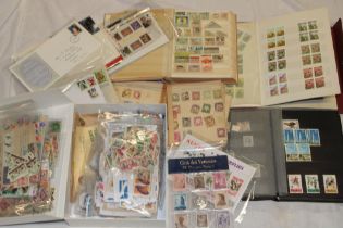 Various stock books of mixed World stamps, packets of stamps,